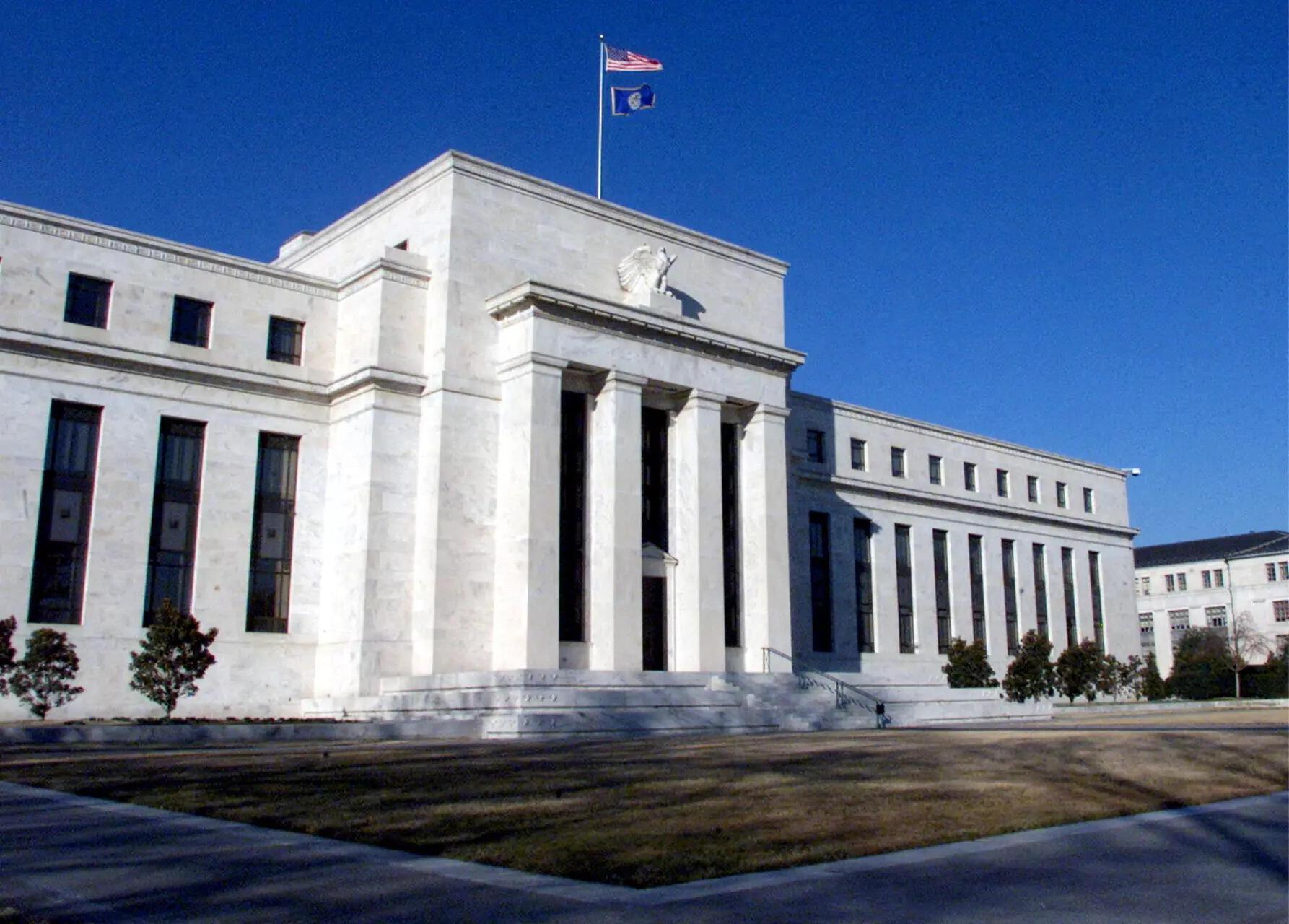 Federal Reserve holds rates steady in a divisive vote