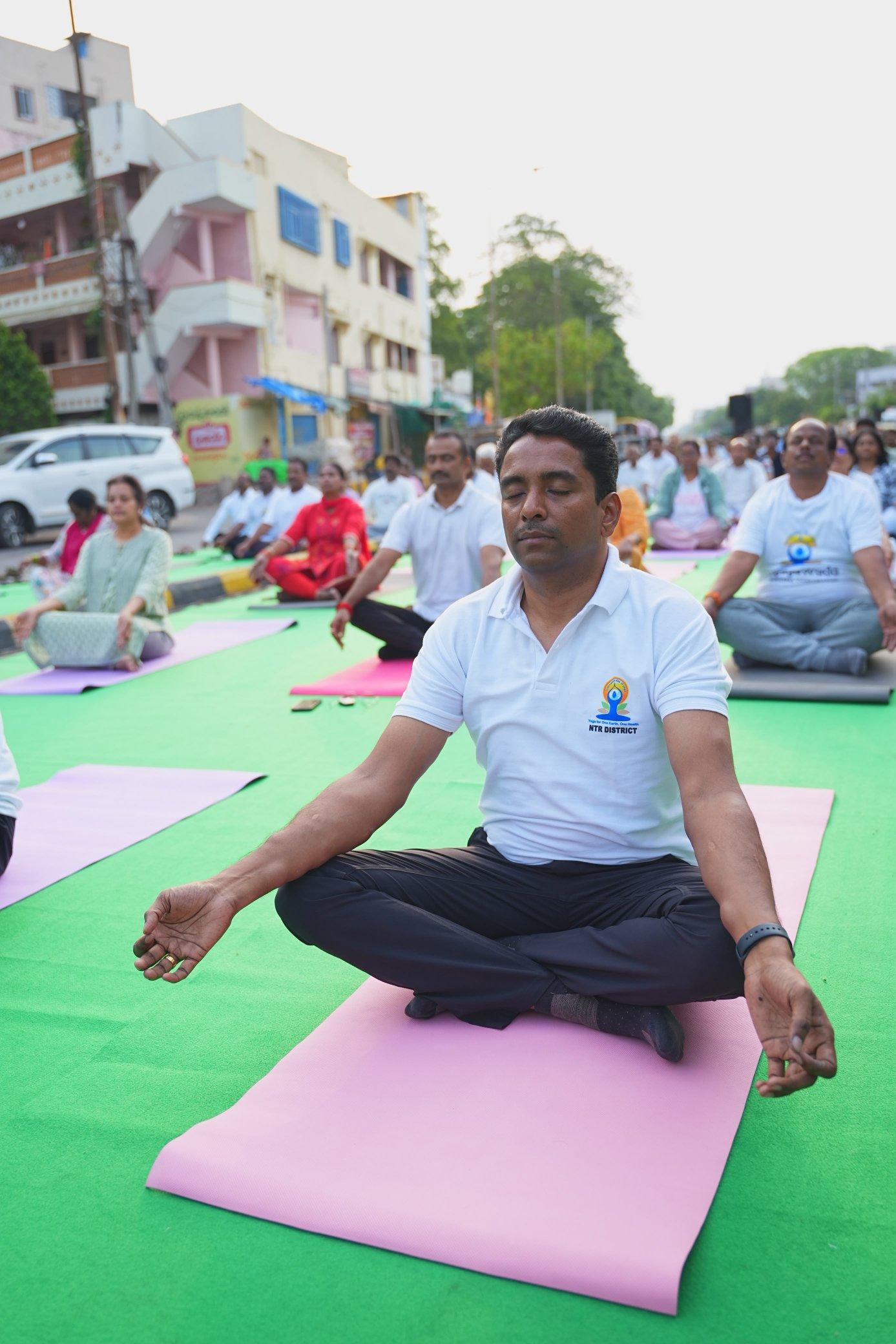 NTR District Collector Leads Yoga, Anti-Plastic Campaigns