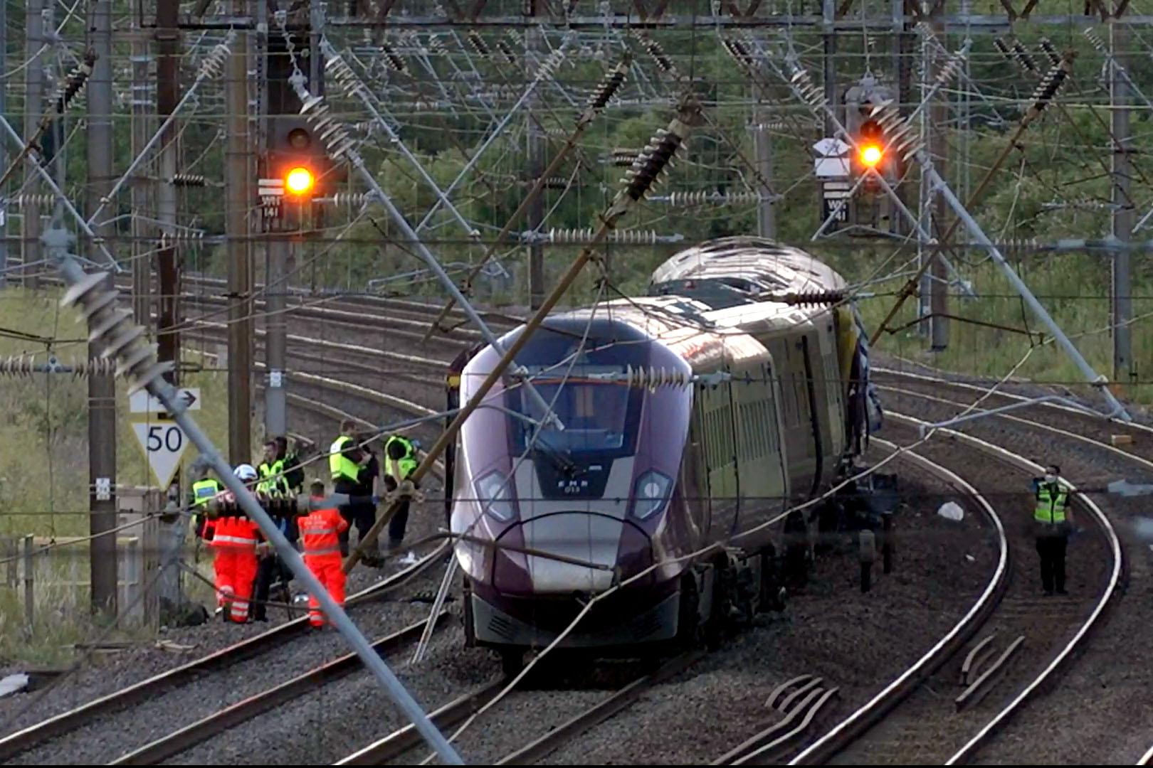 Train Collision North of London Kills 1, Injures Dozens